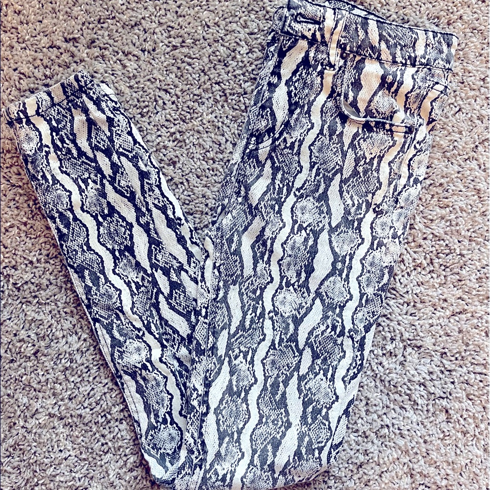 Target brand, snake skin skinny jeans, size 00